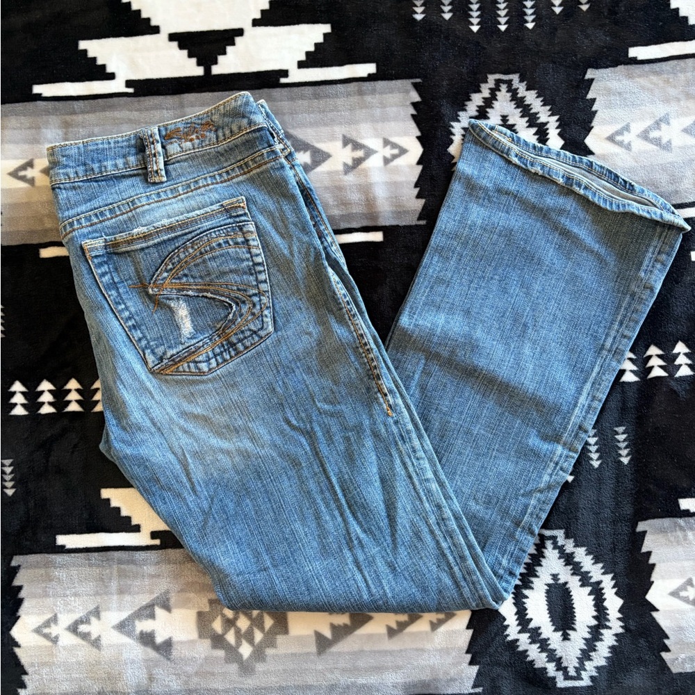 Silver Jeans Medium Blue Bootcut Jeans with Embroidered Back Pockets